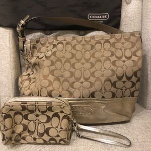 Authentic Coach handbag w/makeup bag.